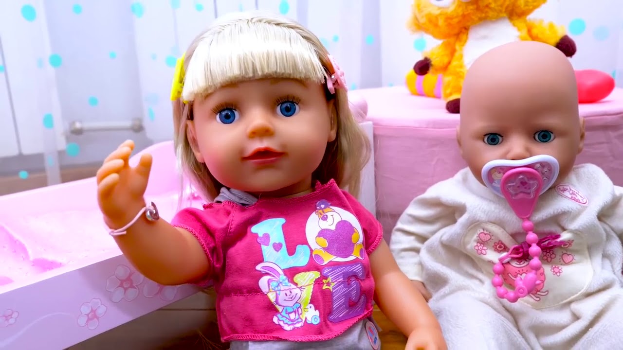 Kız oyunları. Oyuncak bebek Baby Born ablası tanıtımı YouTube