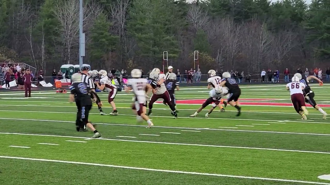 Orono quarterback Jack Brewer is sacked by Brayden Mansur of OOB in the Seagulls state title win