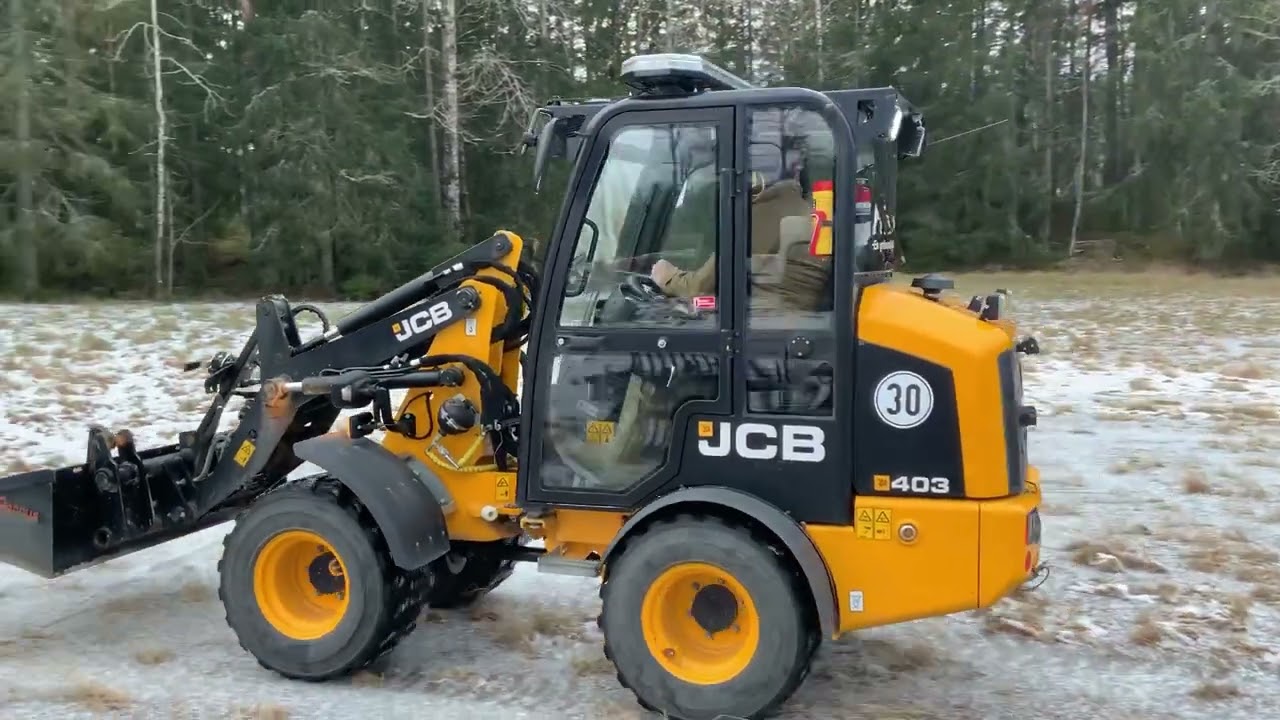 Köp Lastmaskin JCB 403 med 15st redskap på Klaravik