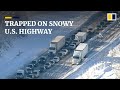 Drivers trapped overnight on snowy US highway