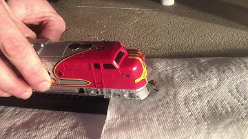 Model train not running smooth? Could be dirty wheels and tracks.