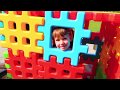 Arina build Playhouse with Toy Colored Blocks