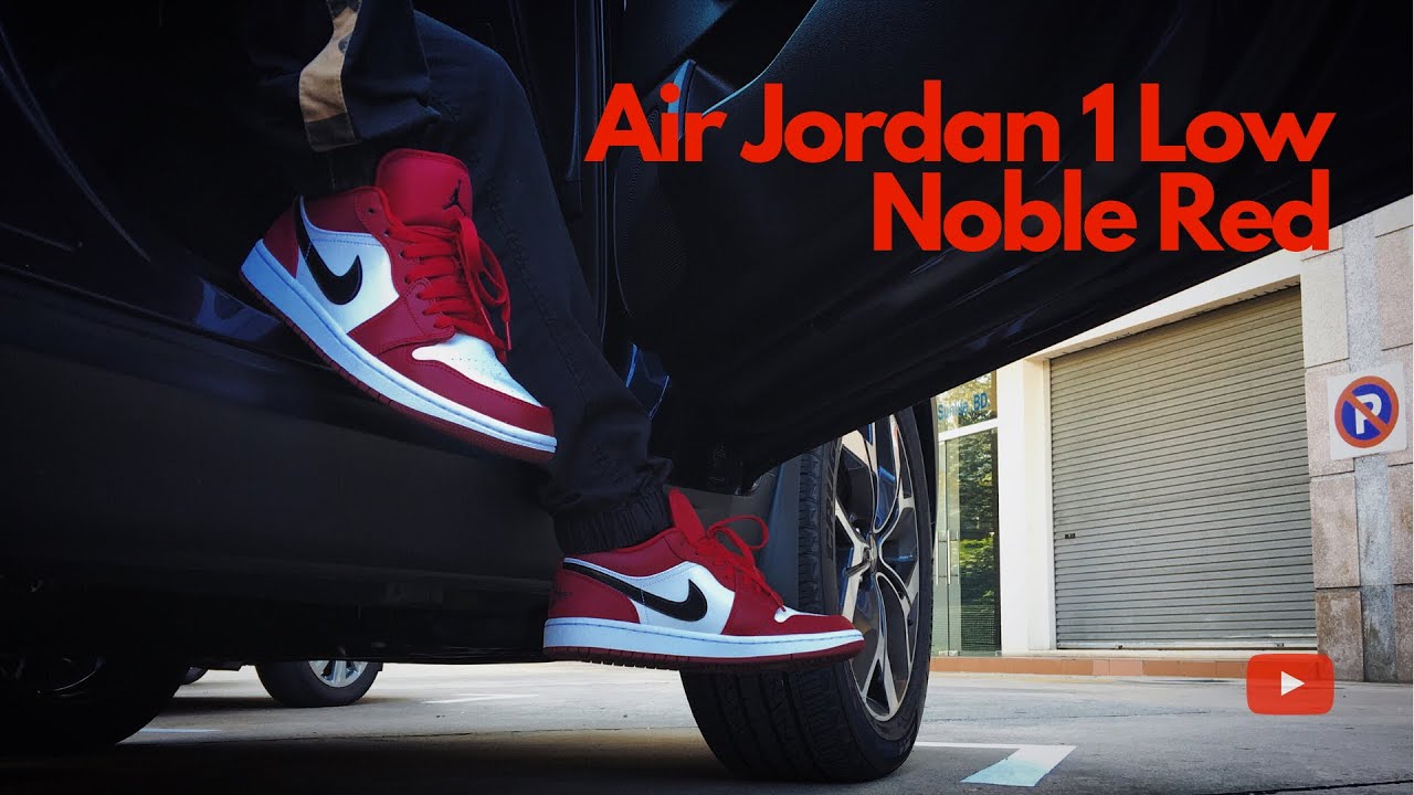 jordan 1 noble red on feet