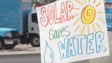 Nevadans rally for solar energy net metering at NV Energy headquarters