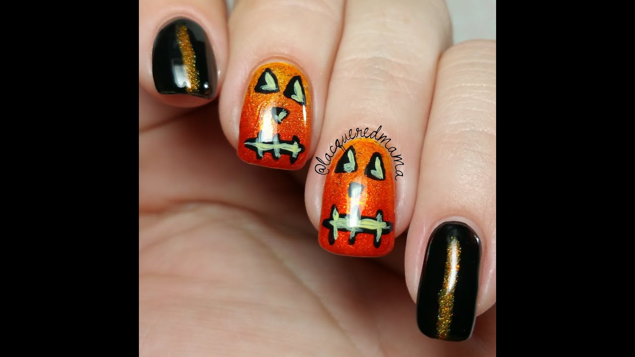 6. Creepy Jack-O-Lantern Nail Art - wide 9