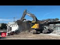 Reed’s Dairy building destroyed in fire earlier this year is being demolished