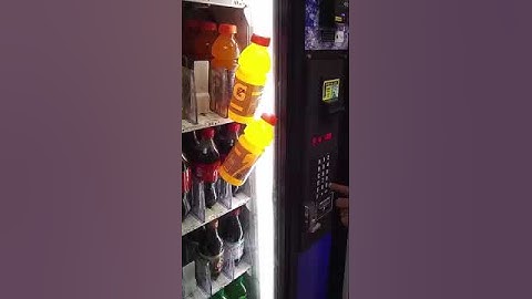 Guy Fails to Retrieve Drinks Stuck in Vending Machine - 990247-1