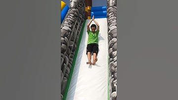 Experience the Thrill of Silky Smooth Sliding on Our Inflatable Slide! #kidsfun #funtimes #slide