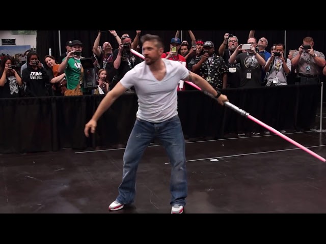 Ray Park (Darth Maul) and a double-bladed lightsaber class=