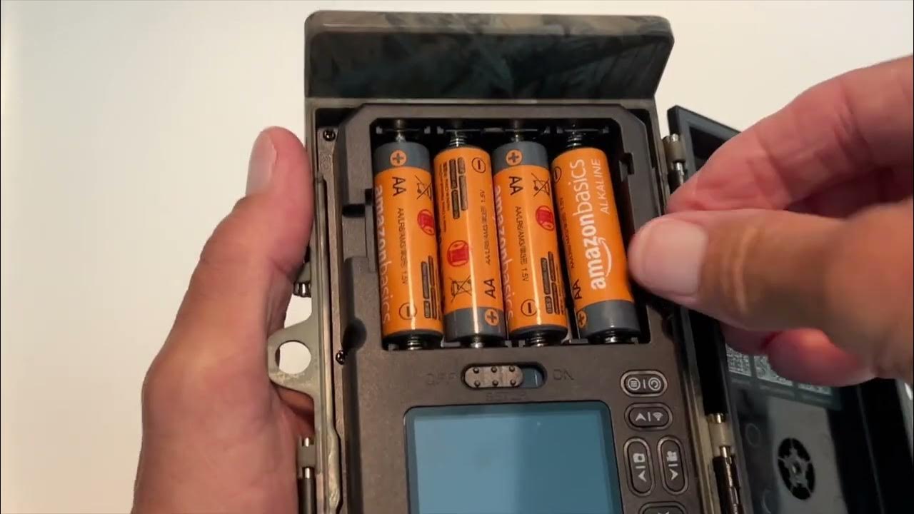 How to insert AA batteries into a CEYOMUR Solar Powered Trail Camera