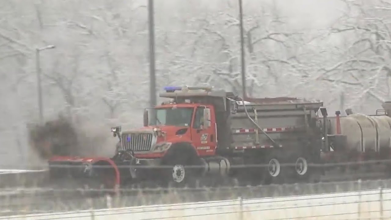 Roadways remain slick in areas as snow tapers off - YouTube