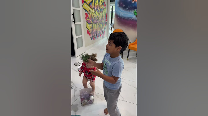 Mom catches daughter and son decorating Christmas tree #shorts