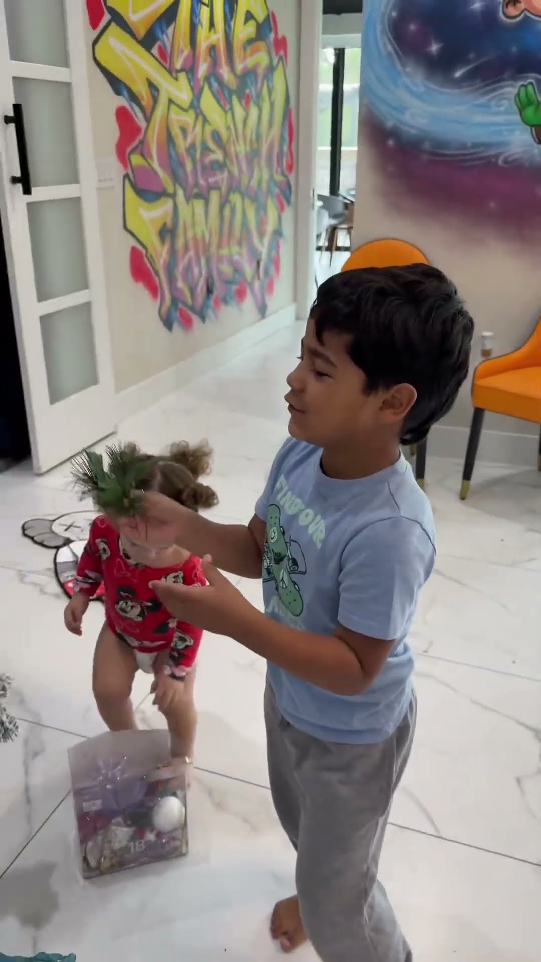 Mom catches daughter and son decorating Christmas tree #shorts