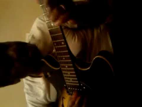 Wilbert Richardson strumming away and chillin at m...