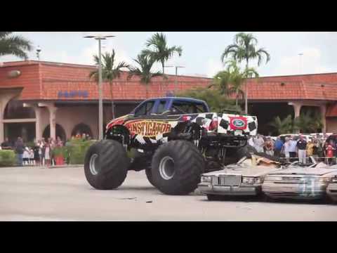 Clunkers crushed by monster truck