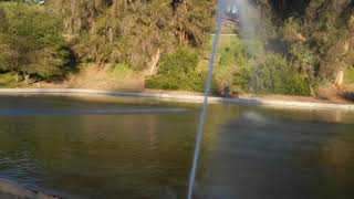 Brushfire Battle Systems water gun and FireBozz Mini running in high winds