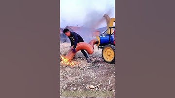 Inhaling the Harvest: How a Self-Feeding Mill Processes Even Smoldering Straw