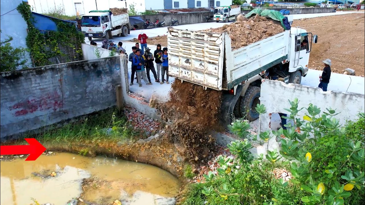First start new project Landfilling up by NISSAN Dump truck 5T unloading Stone and Bulldozer D21P 