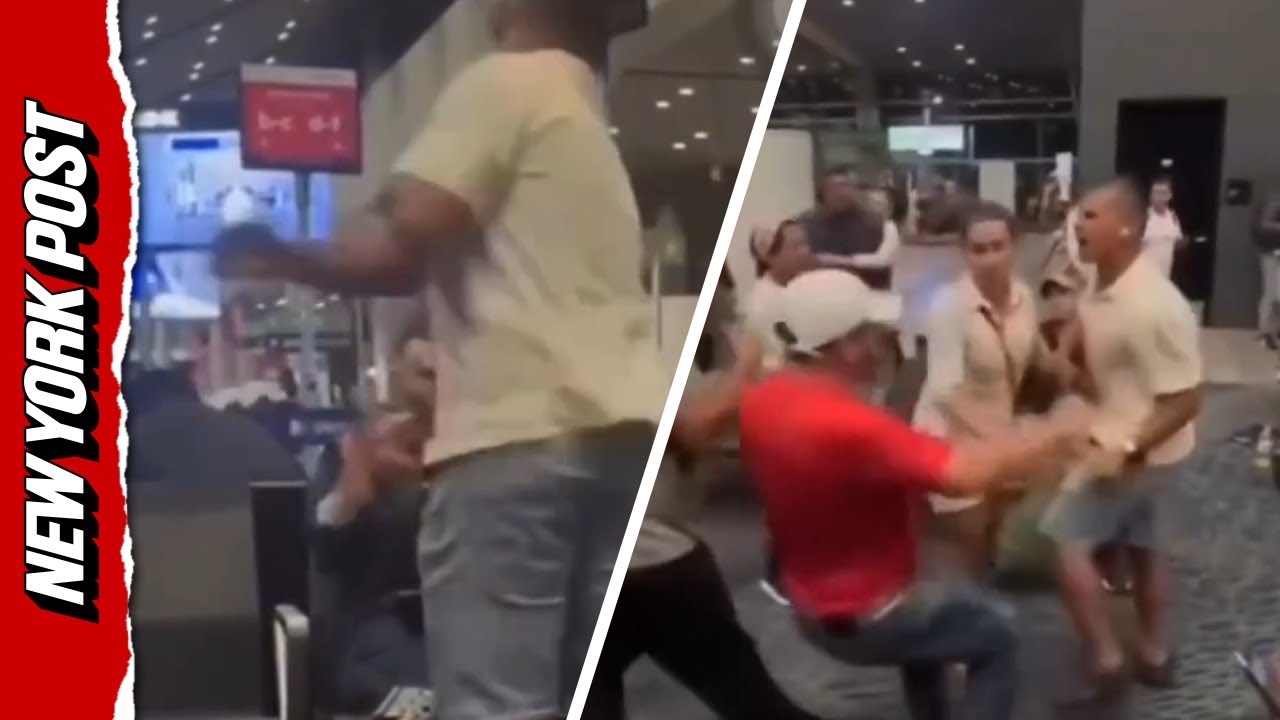 ⁣Vile video shows man SLAPPING woman for not giving up seat at airport terminal