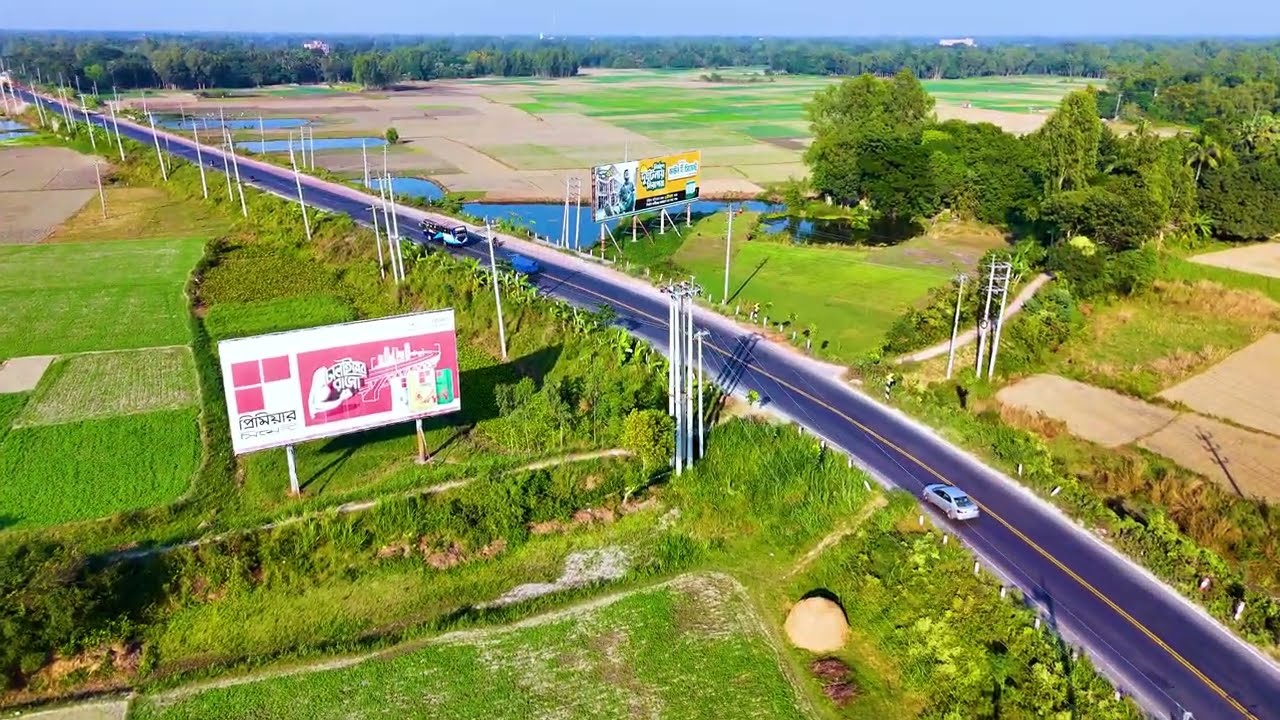 Aerial Bangladesh: Green Farmlands, Flowing River & Modern City | 4K Drone