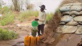WANANCHI HANDENI MJINI WAHOFIA BWAWA LAO KUSOMBWA NA MAJI