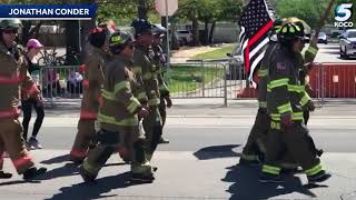 Firefighters carrying American flags walk Oklahoma City Memorial Marathon