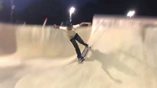 Skateboarder ollies into bowl and lands on his head