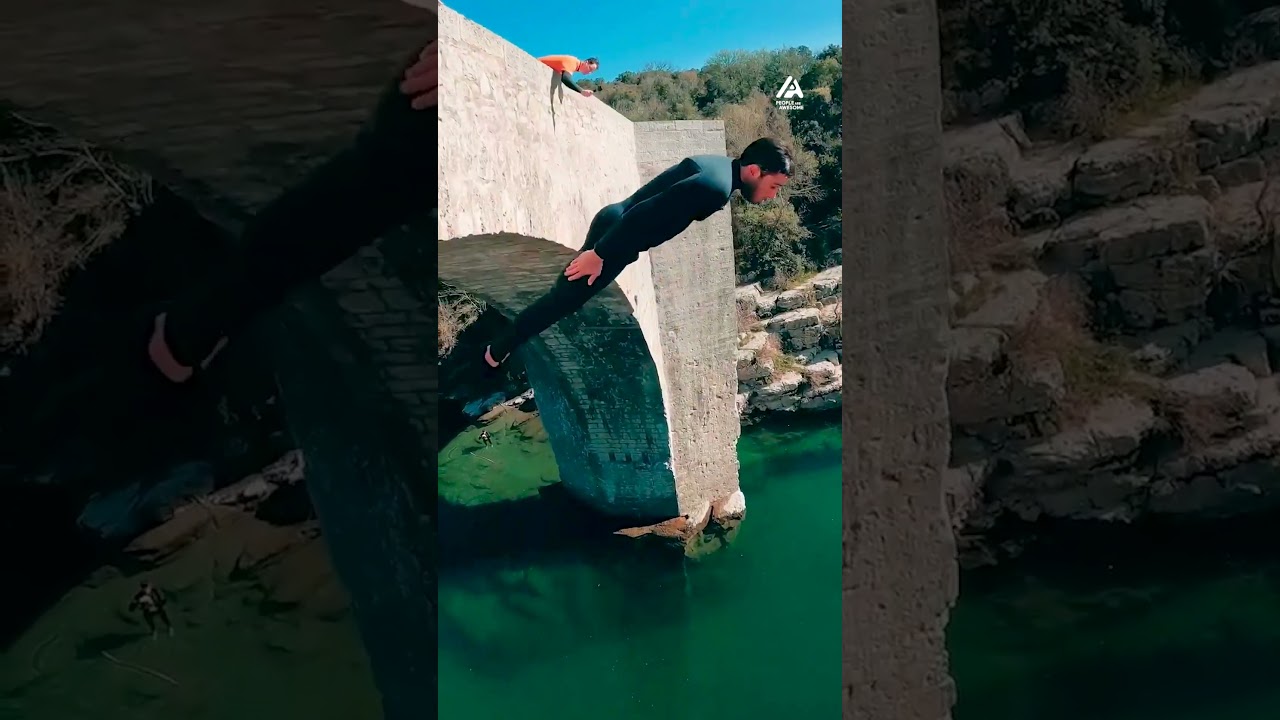Guy Backflips Off Bridge Into Water