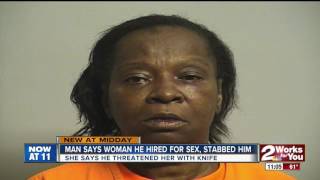 Woman arrested after accused of stabbing a man