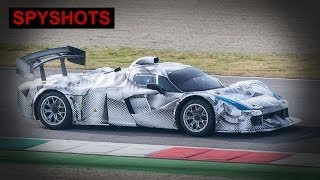 Ferrari lmp1 prototype spy shots - the vehicle was spotted at a secret
test track in southern europe wearing laferrari-like wide body with
huge rear wing...