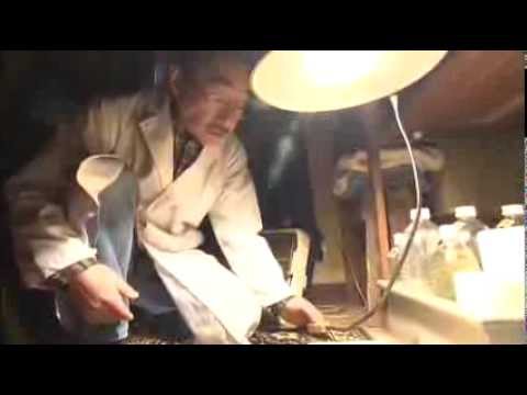 Watching This Japanese Master Rescue an Old Photo Print Is Fascinating