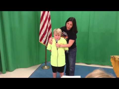 Martin does the morning announcements at Norcrest Elementary School