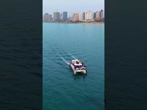 DJI Mini 5 Pro at sea #dji #drone #mini5pro #רחפן#sea #מים #waves #beach #Coastal city #people