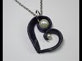 Heart shaped swirl polymer clay pendant with pearls
