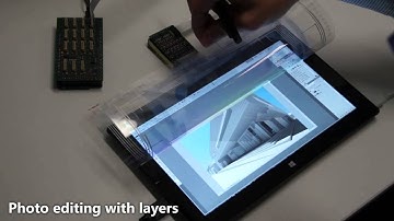FlexSense: A Transparent Self-Sensing Deformable Surface