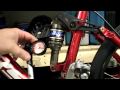 Adjusting rear air shock on a mountain bike Fox Float R example