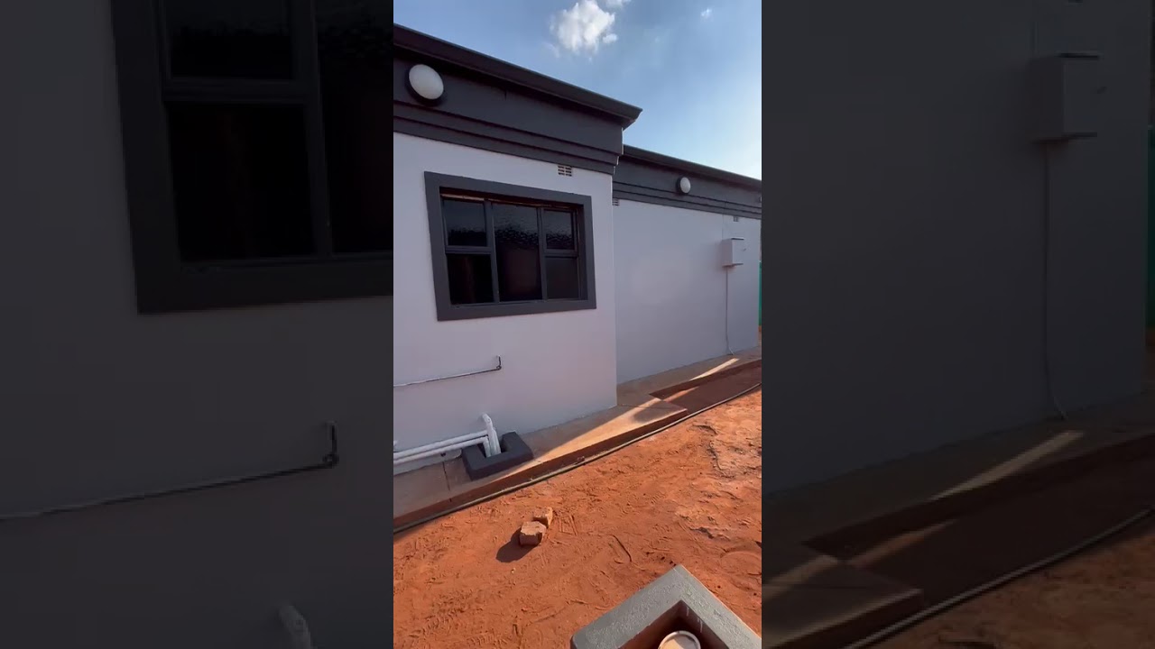 Painting the main house in Zimbabwe completed!