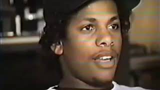 Celebrity Eazy-E Interview talks about Records having curse Words and making people by his Records with a Gun Wealth