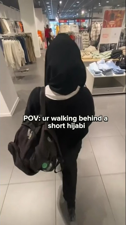 Walking behind short hijabi