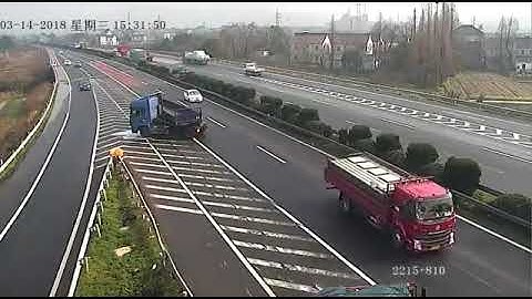 Irresponsible driver missed exit and causes two trucks to crash.