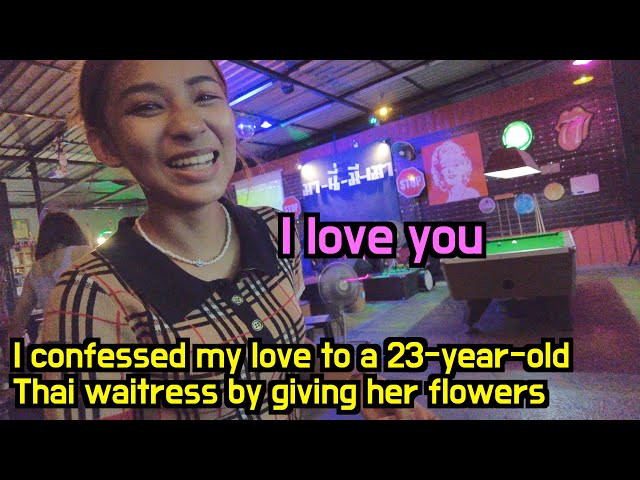 I confessed my love to a 23-year-old cute Thai waitress by giving her flowers class=