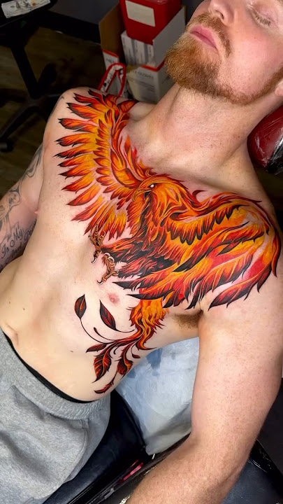 The tattoo depicted is a vibrant and detailed phoenix, a mythical bird! #tattoo#drawing_complex
