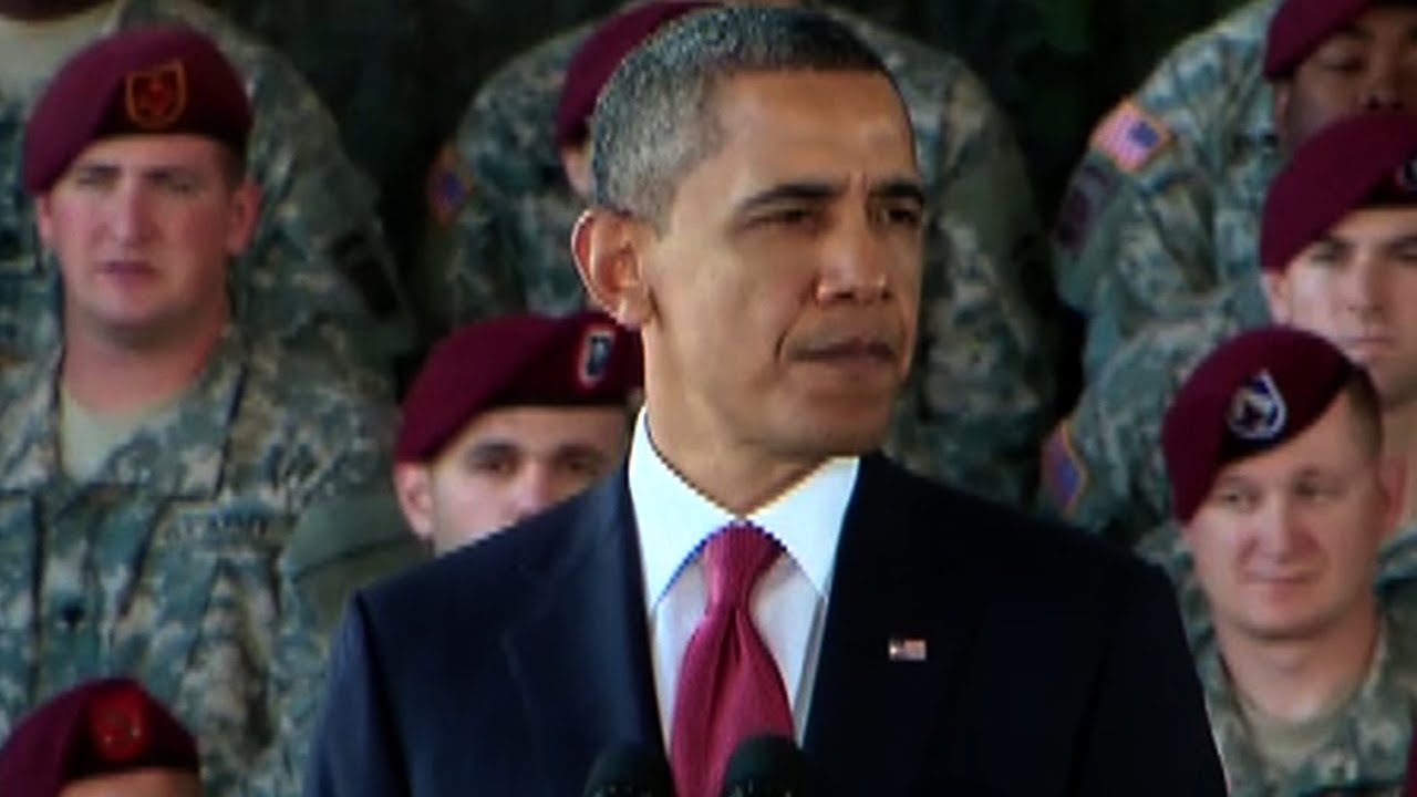 Obama, the Guy with the Purple Shirt, and a Promise Kept