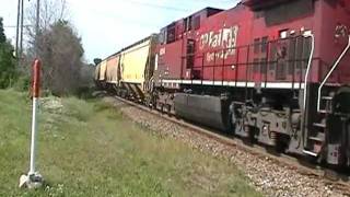 CP 8823 LEADS TRAIN 280 EAST (SOUTH) ACROSS WATERFORD AVE.  7-9-11.MOD