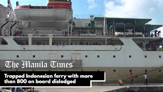 Trapped Indonesian ferry with more than 800 on board dislodged