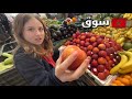 American girl shops at local market in morocco 