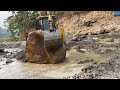 Digging Out River Treasure to Protect Mountain Low Bed Road