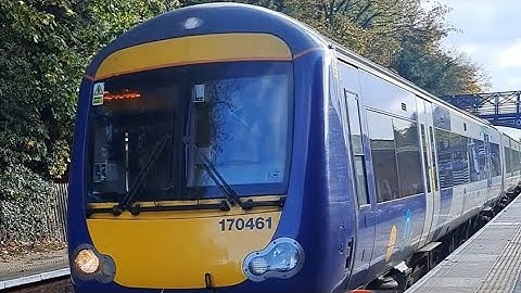 a class 170 crossings Cottingham level crossings