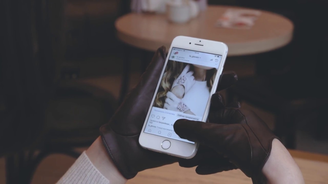 Girl drinks coffee in leather gloves by LA1007