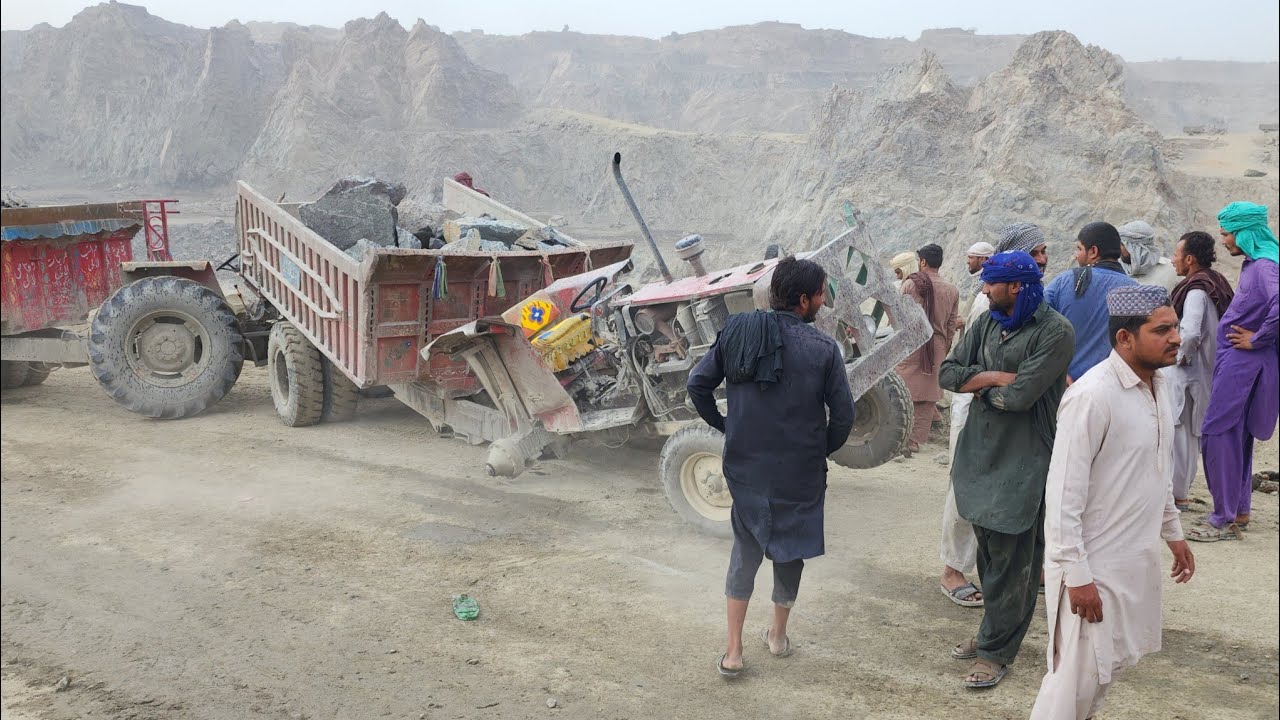 Rear Axle of Massey 385 Tractor Broken While Pulling a Big Stone Loaded Trolley